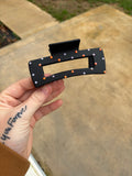 Black and red claw clip