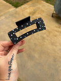 Black and blue claw clip